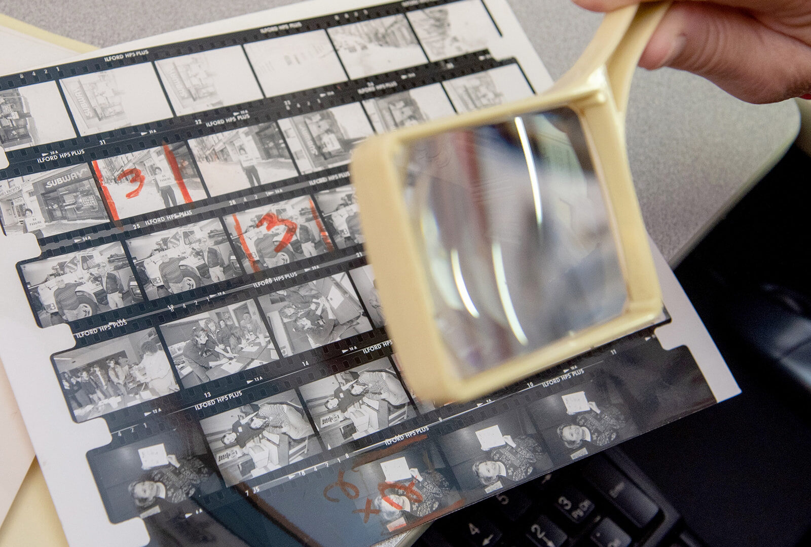 Magnifying glass looking at images
